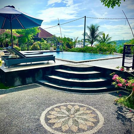 Отель Dmas Huts Lembongan Экстерьер фото